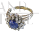 Platinum ring with cabochon sapphire and diamonds 