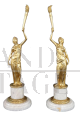 Pair of sculptural female figures in gilded bronze and alabaster