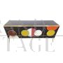 Credenza retroilluminata in vetro nero con cerchi colorati