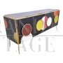 Credenza retroilluminata in vetro nero con cerchi colorati