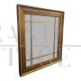 Specchiera con cornice in legno dorato