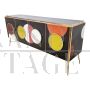 Credenza retroilluminata in vetro nero con cerchi colorati