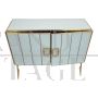 Credenza design a due ante in vetro bianco e ottone