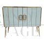 Credenza design a due ante in vetro bianco e ottone                            