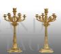 Coppia di candelabri flambeaux antichi Napoleone III in bronzo dorato                            