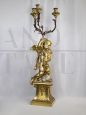 Candelabro a tre bracci con putto alato, XX secolo