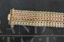 Bracciale anni '60 in oro 14 kt con zaffiri, rubini, smeraldi e turchesi