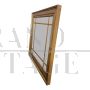 Specchiera con cornice in legno dorato