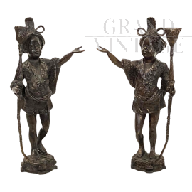 Pair of antique candlesticks with Venetian Moors in bronze, 20th century