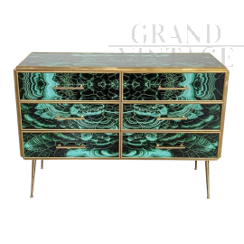 Wooden dresser covered in green malachite effect glass