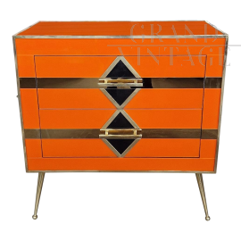 Art deco style bedside cabinet in orange glass with geometries