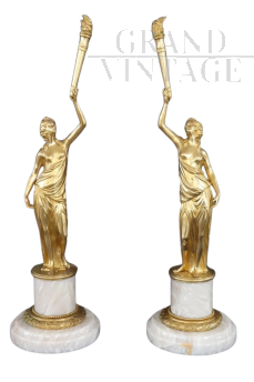 Pair of sculptural female figures in gilded bronze and alabaster