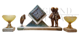 Demetre Chiparus - Clock with sculptures and cups in bronze, glass and marble