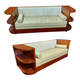 Art deco sofa in wood and white eco-leather with open shelves    
