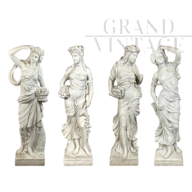Group of 4 statues depicting the Four Seasons in white marble