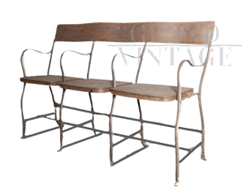Vintage industrial metal bench with folding seats  