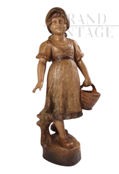 Goldscheider sculpture of a girl in terracotta