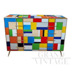 Design dresser covered with multicolored Murano glass squares