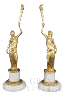 Pair of sculptural female figures in gilded bronze and alabaster