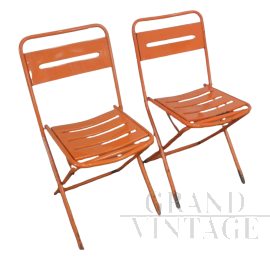 Pair of orange metal garden chairs, 1970s