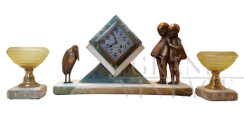 Demetre Chiparus - Clock with sculptures and cups in bronze, glass and marble