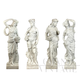 Group of 4 statues depicting the Four Seasons in white marble