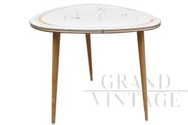 Coffee table with decorated white formica top