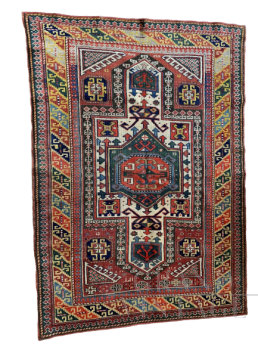 Antique Caucasian rug from the mid-1800s