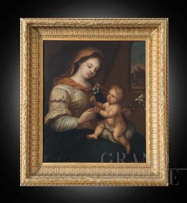 Antique oil painting on canvas depicting the Madonna and Child