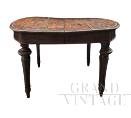 Antique extendable table with oval top