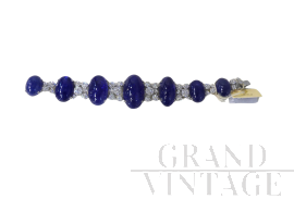 Bracciale in oro bianco con diamanti e Tanzanite cabochon                            