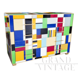 Design dresser covered with multicolored Murano glass tiles