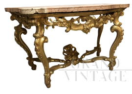 Roman Louis XV console in carved and gilded wood