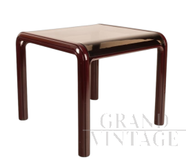 Orsay 54A table by Gae Aulenti for Knoll with glass top, burgundy color