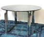 Round space age table in steel and glass                            