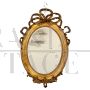 Antique 19th century oval mirror in gold leaf