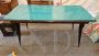 Design table by Ico Parisi with teal green glass top                            