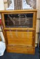 Small vintage bookcase with retractable doors