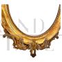 Antique 19th century oval mirror in gold leaf