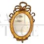 Antique 19th century oval mirror in gold leaf