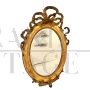 Antique 19th century oval mirror in gold leaf