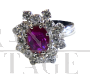 White gold ring with ruby ​​and diamonds