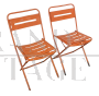 Pair of orange metal garden chairs, 1970s