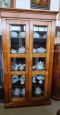 Vintage display cabinet glass cupboard in oak, with beveled glasses