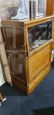 Small vintage bookcase with retractable doors