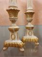 Pair of lacquered and gilded wooden candlesticks