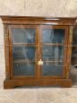 English display cabinet from the 19th century with bronzes