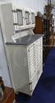 Vintage high cupboard in white wood with small drawers and marble top