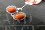 White gold ring with diamonds and double Sardinian coral 