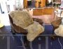 Pair of design armchairs in wood and rope with faux fur cushions                            
                            